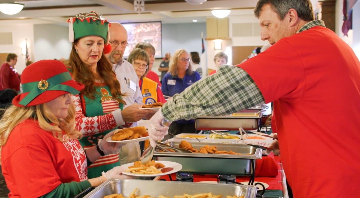 Fellowship staff serving up food at Zephyr Express