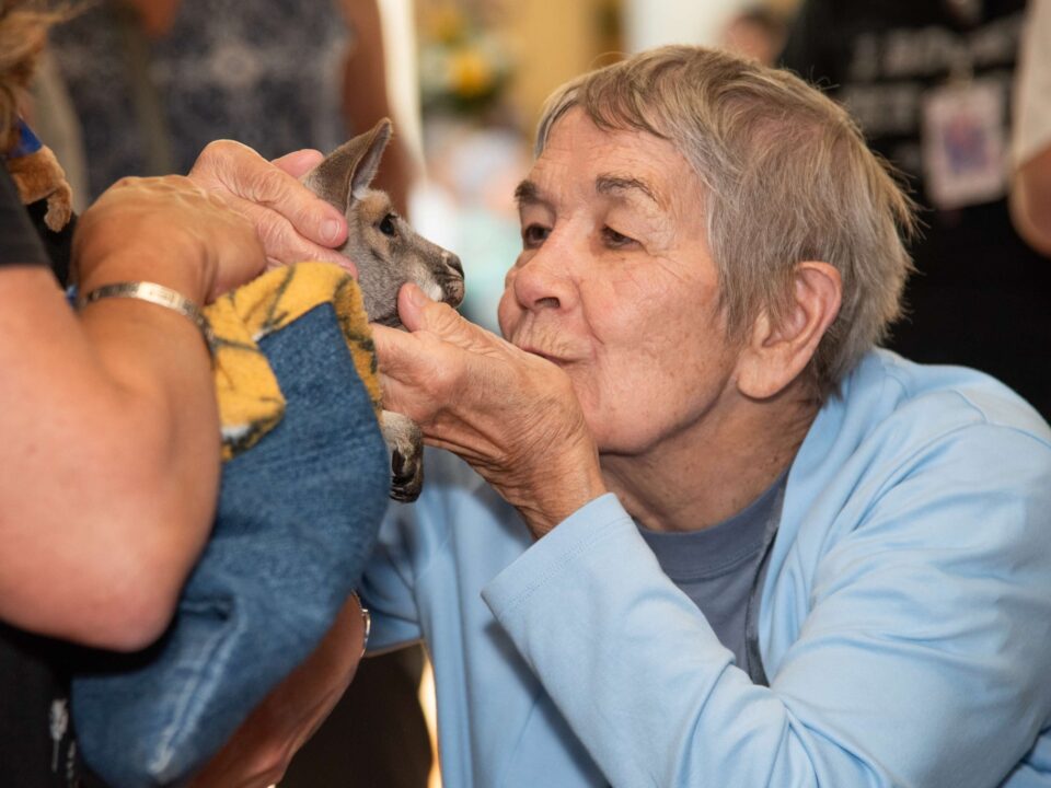resident with kangaroo